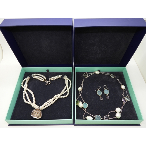 865 - Two Dower & Hall necklaces, to include a three strand cultured pearl necklace with a rose pendan... 