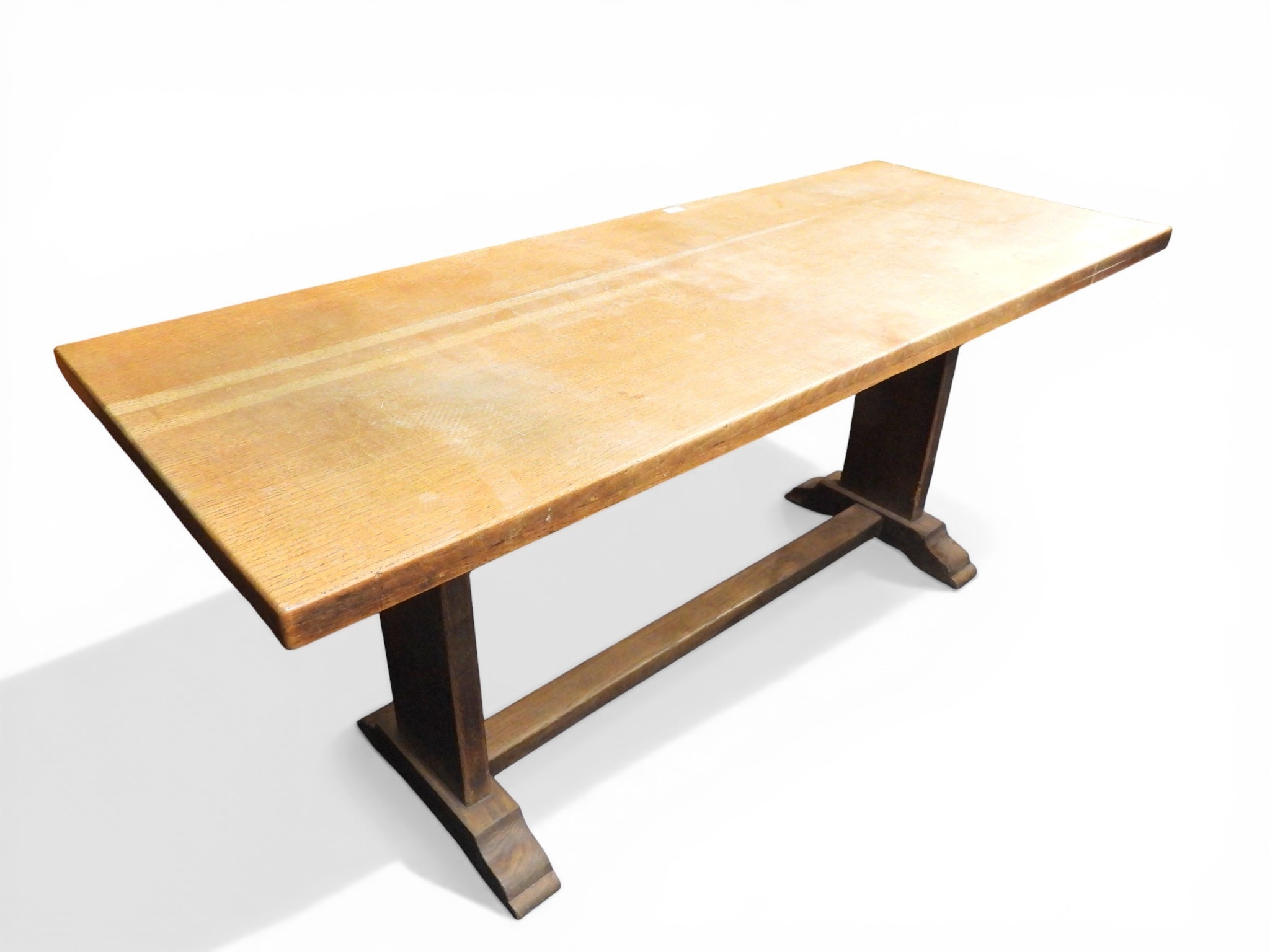 An early to mid 20th century oak refectory style table with rectangular ...
