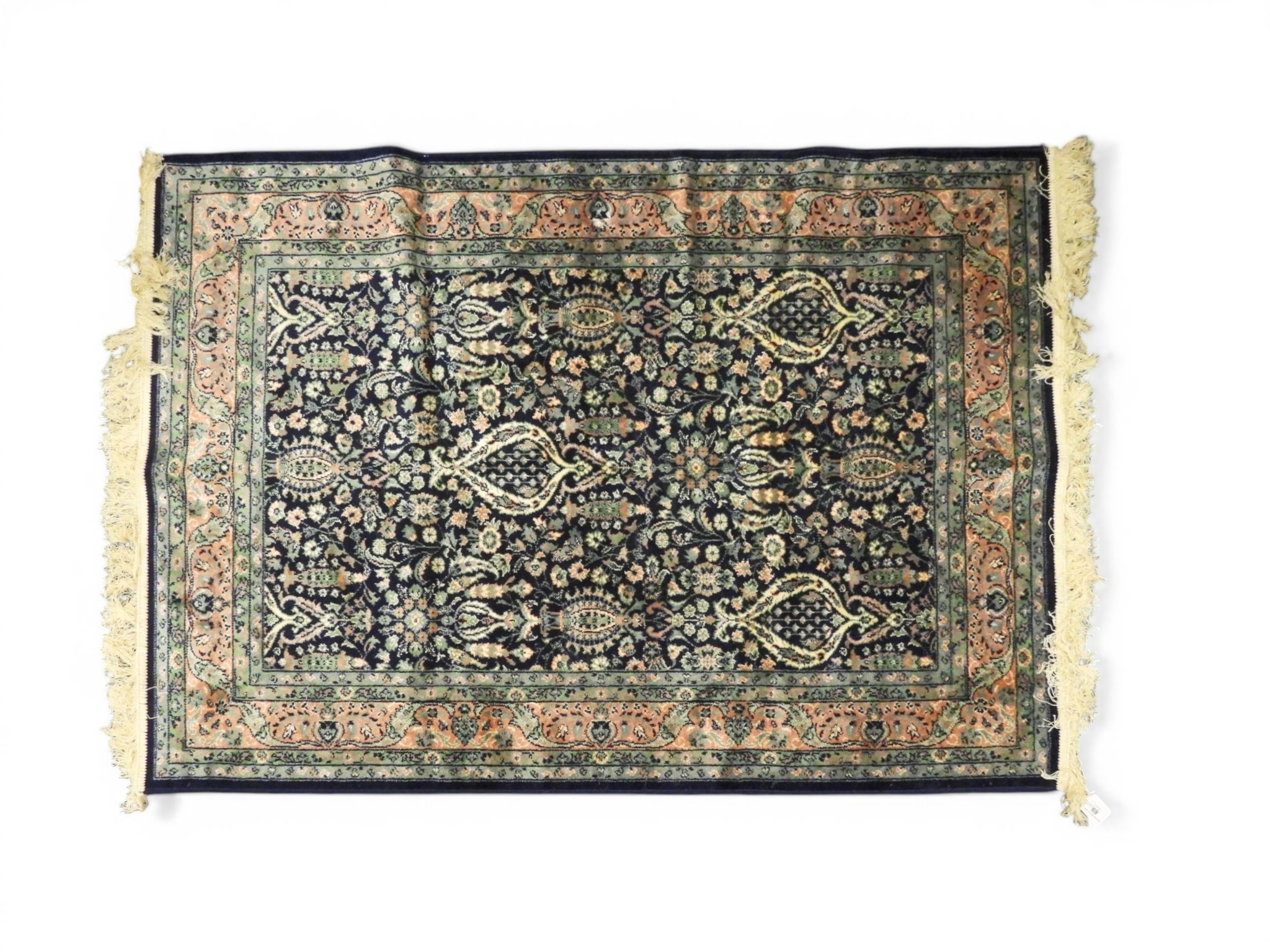 A contemporary dark blue eastern style rug with all over floral ...