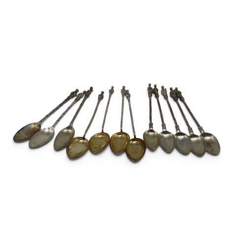 A collection of Chinese silver teapoons, some by Wang Hing, with figural finials, 195gms