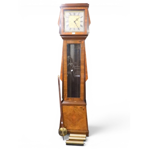 30 - An early 20th century Art Deco style walnut and sample wood veneered longcase clock with brass and s... 