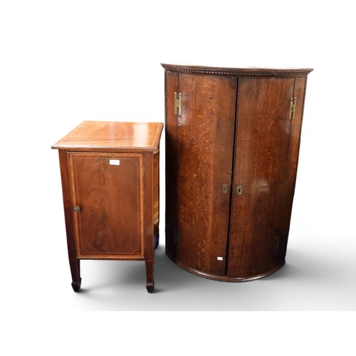 31 - A lot comprising a 19th century oak veneered two door bow front hanging corner cabinet, 109cm high x... 