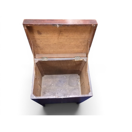 33 - A small 19th century mahogany veneered cellarette with hinged top over brass carry handles on square... 