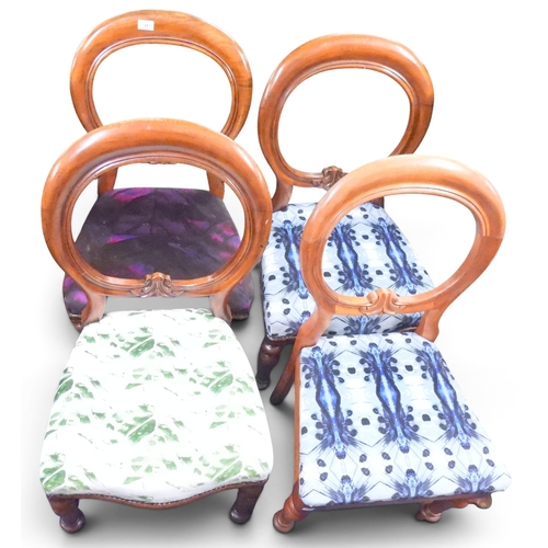 34 - A lot of four Victorian mahogany framed balloon back chairs two upholstered in Iona Crawford 
