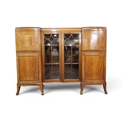 5 - A 20th century mahogany display cabinet with pair of beaded glazed doors flanked by bow fronted cabi... 