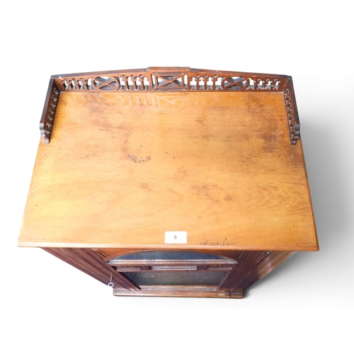 8 - A Victorian mahogany music cabinet with pierced gallery top over single mirrored/glazed door on plin... 