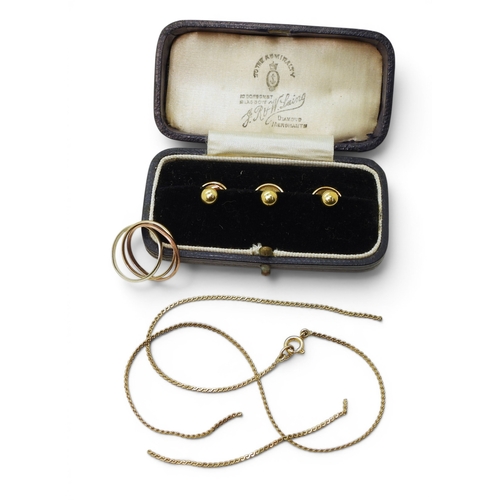 703 - Three 9ct gold shirt studs in box, a tricolour Russian weddding ring, and a broken 'S' chain, weight... 