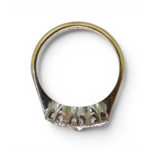 707 - A 9ct gold three stone illusion set diamond ring, size M1/2, weight 2.3gms