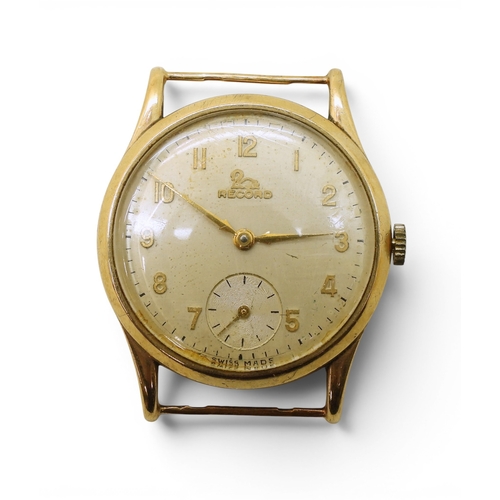 711 - A 9ct gold gents Record watch head, hallmarked London 1954, diameter3.2cm, weight including mechanis... 