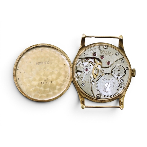 711 - A 9ct gold gents Record watch head, hallmarked London 1954, diameter3.2cm, weight including mechanis... 