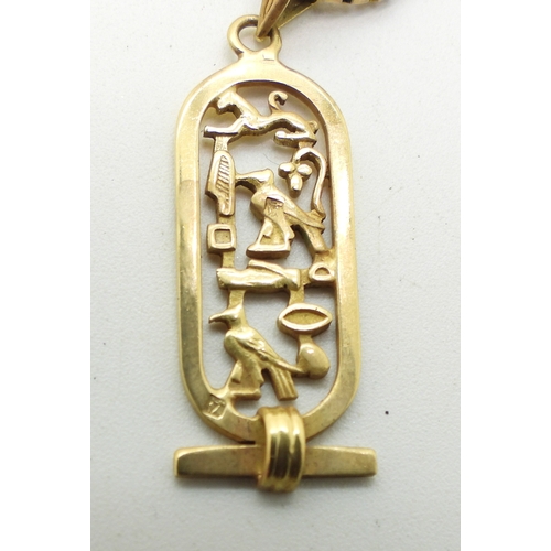 713 - An Arabic gold Egyptian hieroglyph pendant weight 2.4gms, a 9ct gold 38cm box chain, weight 4.9gms
