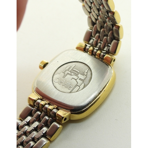714 - A gold plated ladies Omega Deville, with striped gold coloured dial and baton numerals and hands.