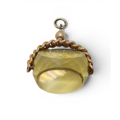 723 - A large citrine swivel fob, with a yellow metal chain link mount, weight 20gms