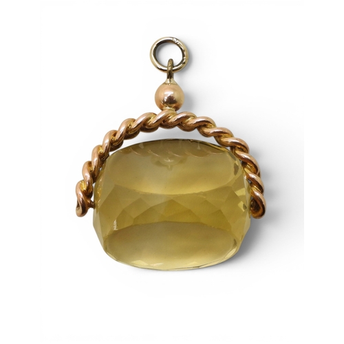 723 - A large citrine swivel fob, with a yellow metal chain link mount, weight 20gms