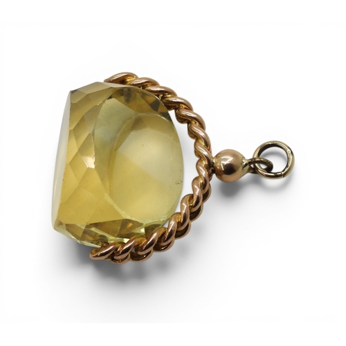 723 - A large citrine swivel fob, with a yellow metal chain link mount, weight 20gms