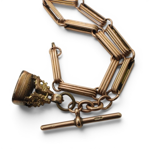 728 - A 9ct rose gold fancy baton link fob chain, hallmarked to the 'T' bar and end links, length 30cm, wi... 