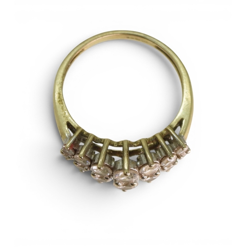 734 - A 14k gold clear gem set cluster ring, size M1/2, weight 2.8gms