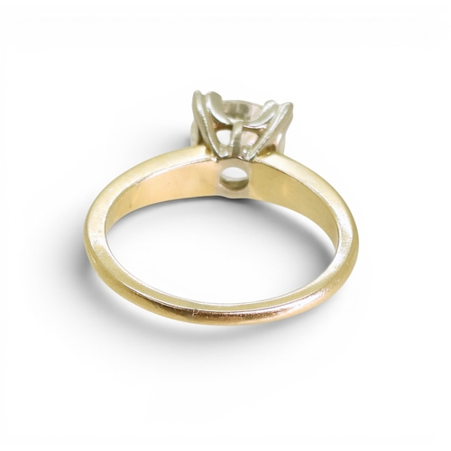 735 - A 14k gold white zircon solitaire ring, size M, weight 3.9gms