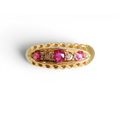 741 - A bright yellow metal ring set with synthetic rubies and diamond accents, (partial hallmark for Ches... 