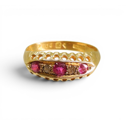 741 - A bright yellow metal ring set with synthetic rubies and diamond accents, (partial hallmark for Ches... 