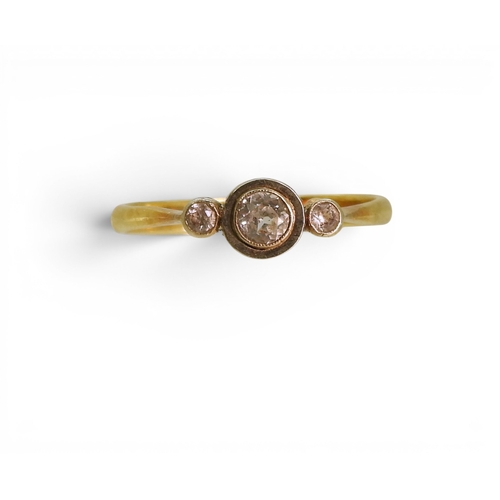 748 - An 18ct gold and platinum white sapphire three stone ring, size q, weight 2.4gms
