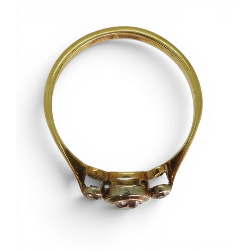 748 - An 18ct gold and platinum white sapphire three stone ring, size q, weight 2.4gms