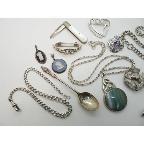 882 - Two silver fob chains, a silver Apostle spoon, Scottish themed brooches to include Thomas Kerr Ebbut... 