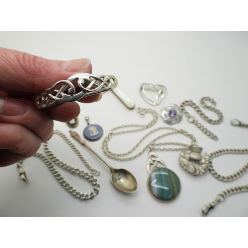882 - Two silver fob chains, a silver Apostle spoon, Scottish themed brooches to include Thomas Kerr Ebbut... 