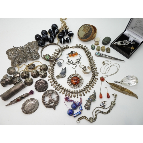 884 - A silver Caithness ring, A large silver butterfly shaped buckle, a collection of carved scarabs, a w... 