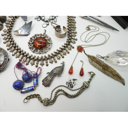 884 - A silver Caithness ring, A large silver butterfly shaped buckle, a collection of carved scarabs, a w... 