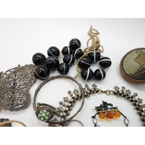 884 - A silver Caithness ring, A large silver butterfly shaped buckle, a collection of carved scarabs, a w... 
