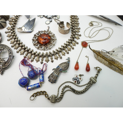 884 - A silver Caithness ring, A large silver butterfly shaped buckle, a collection of carved scarabs, a w... 