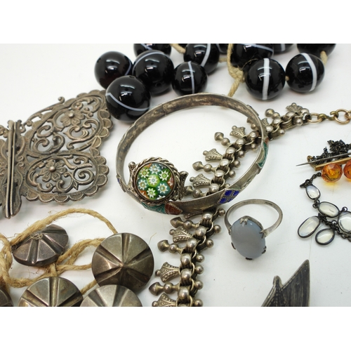 884 - A silver Caithness ring, A large silver butterfly shaped buckle, a collection of carved scarabs, a w... 