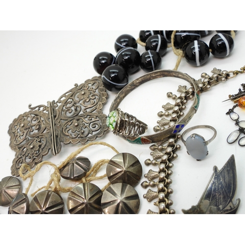 884 - A silver Caithness ring, A large silver butterfly shaped buckle, a collection of carved scarabs, a w... 