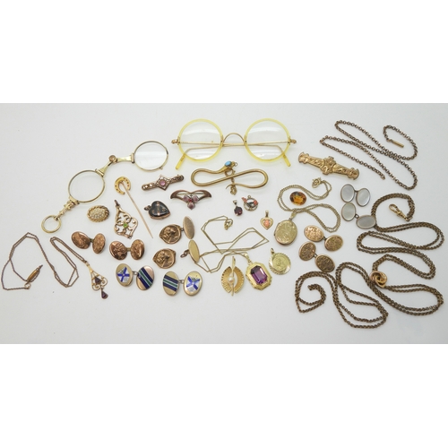 888 - A fun collection of gold plated, bonded and rolled gold items to include a snake tie slide, a horses... 