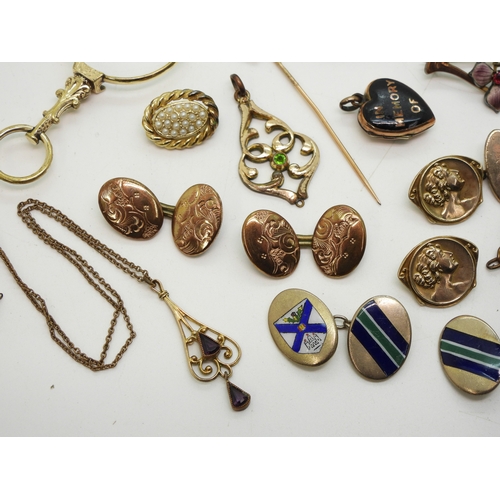 888 - A fun collection of gold plated, bonded and rolled gold items to include a snake tie slide, a horses... 