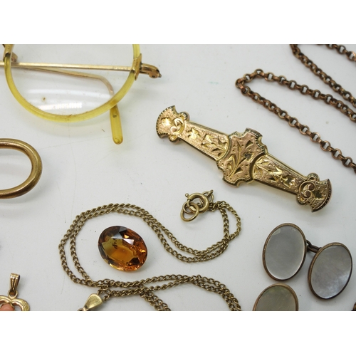 888 - A fun collection of gold plated, bonded and rolled gold items to include a snake tie slide, a horses... 