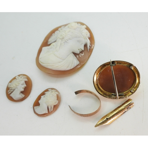 747A - A yellow metal mounted cameo brooch, a partial 9ct wedding ring and a yellow metal pen nib, weight a... 