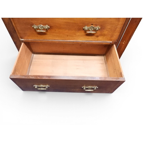 2039 - A LATE 19TH CENTURY MAHOGANY NARROW WELLINGTON STYLE SECRETAIRE CHEST OF DRAWERS with two drawers ov... 