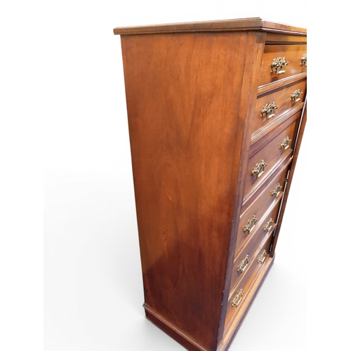 2039 - A LATE 19TH CENTURY MAHOGANY NARROW WELLINGTON STYLE SECRETAIRE CHEST OF DRAWERS with two drawers ov... 
