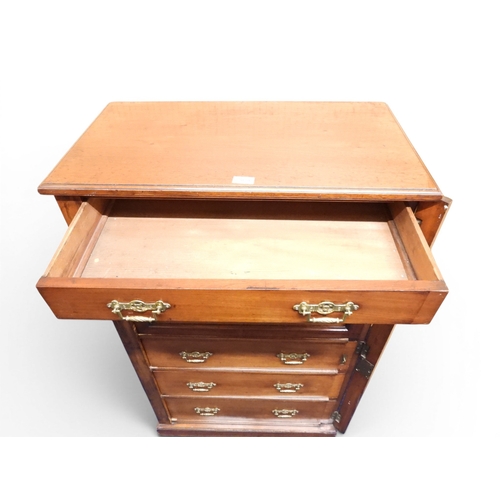 2039 - A LATE 19TH CENTURY MAHOGANY NARROW WELLINGTON STYLE SECRETAIRE CHEST OF DRAWERS with two drawers ov... 