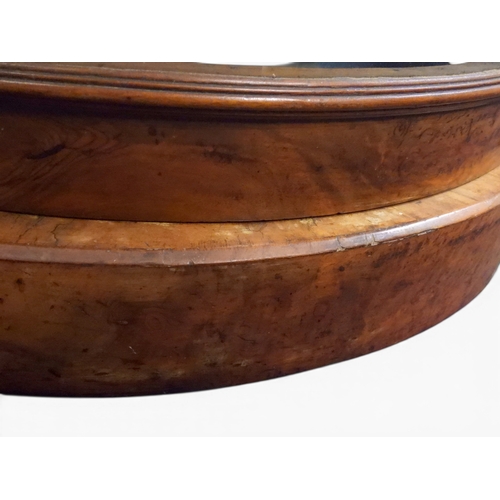 2040 - A VICTORIAN WALNUT VENEERED CREDENZAwith carved scrolled backsplash over central glazed doors flanke... 