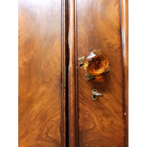 2041 - A VICTORIAN WALNUT VENEERED TWO DOOR WARDROBE&nbsp;with moulded cornice over pair of full length mir... 