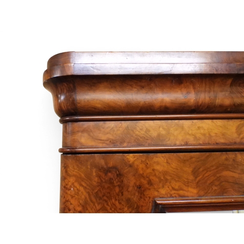 2041 - A VICTORIAN WALNUT VENEERED TWO DOOR WARDROBE&nbsp;with moulded cornice over pair of full length mir... 