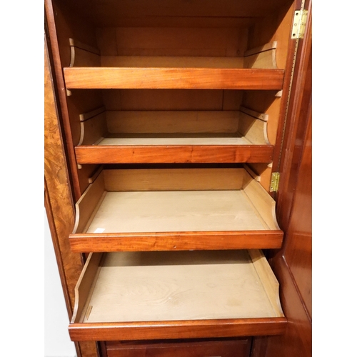 2041 - A VICTORIAN WALNUT VENEERED TWO DOOR WARDROBE&nbsp;with moulded cornice over pair of full length mir... 