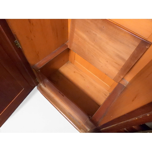 2041 - A VICTORIAN WALNUT VENEERED TWO DOOR WARDROBE&nbsp;with moulded cornice over pair of full length mir... 