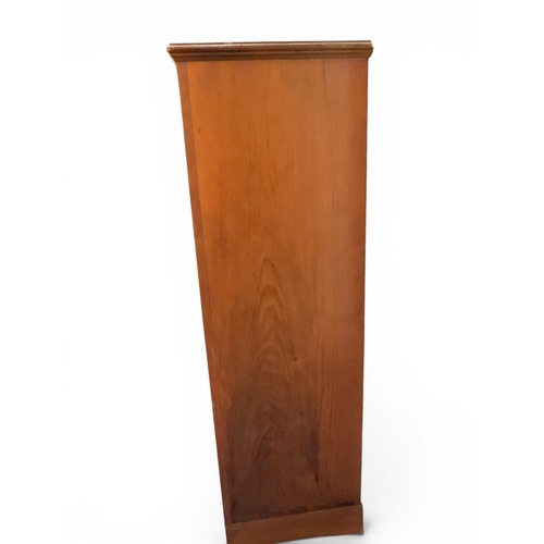 2042 - AN EARLY 20TH CENTURY OAK FOUR DOOR BOOKCASE&nbsp;with plain top over four leaded stained glass door... 