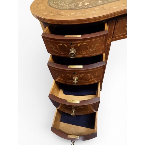 2043 - A LARGE 19TH CENTURY SHERATON REVIVAL STYLE MARQUETRY INLAID KIDNEY SHAPED DESKwith embossed skiver ... 