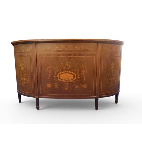2043 - A LARGE 19TH CENTURY SHERATON REVIVAL STYLE MARQUETRY INLAID KIDNEY SHAPED DESKwith embossed skiver ... 