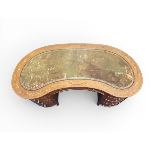 2043 - A LARGE 19TH CENTURY SHERATON REVIVAL STYLE MARQUETRY INLAID KIDNEY SHAPED DESKwith embossed skiver ... 